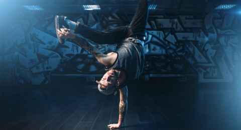 breakdance action, dancer posing in dance studio