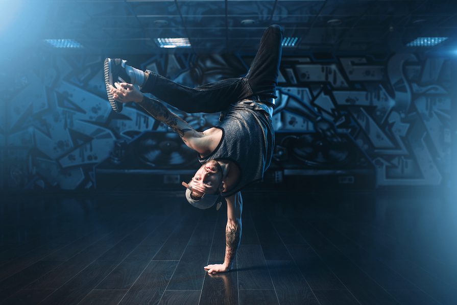 breakdance action, dancer posing in dance studio