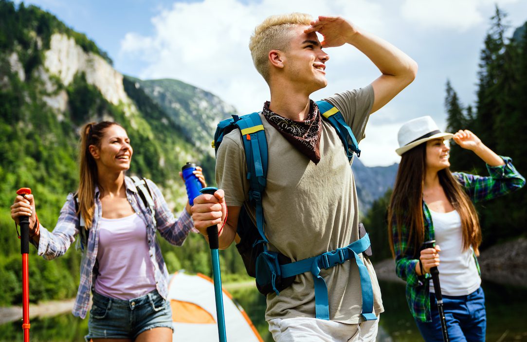 Hiker friends trekking as part of healthy lifestyle outdoors activity