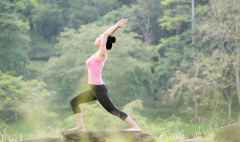 young asian woman practicing yoga