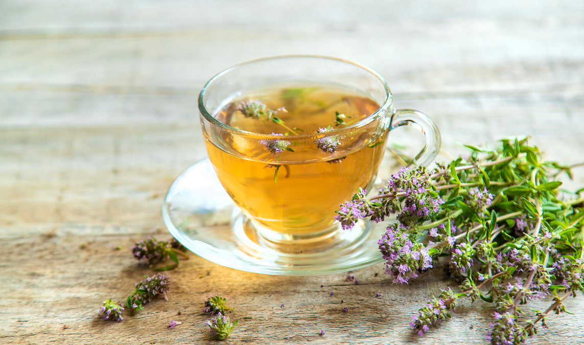 thyme tea in a cup. selective focus.