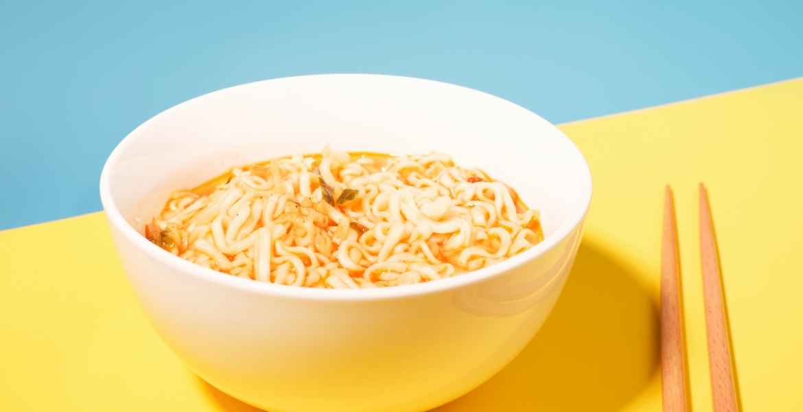 a bowl with ready instant noodles and chopsticks o 2023 11 27 05 01 19 utc