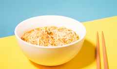 a bowl with ready instant noodles and chopsticks o 2023 11 27 05 01 19 utc