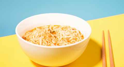 a bowl with ready instant noodles and chopsticks o 2023 11 27 05 01 19 utc